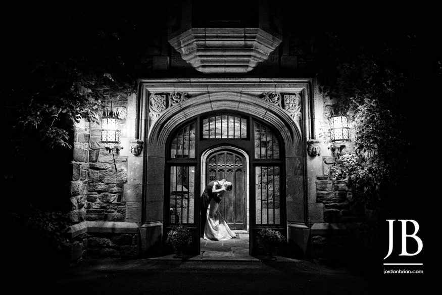 castle at skylands manor wedding bride and groom night photo outside